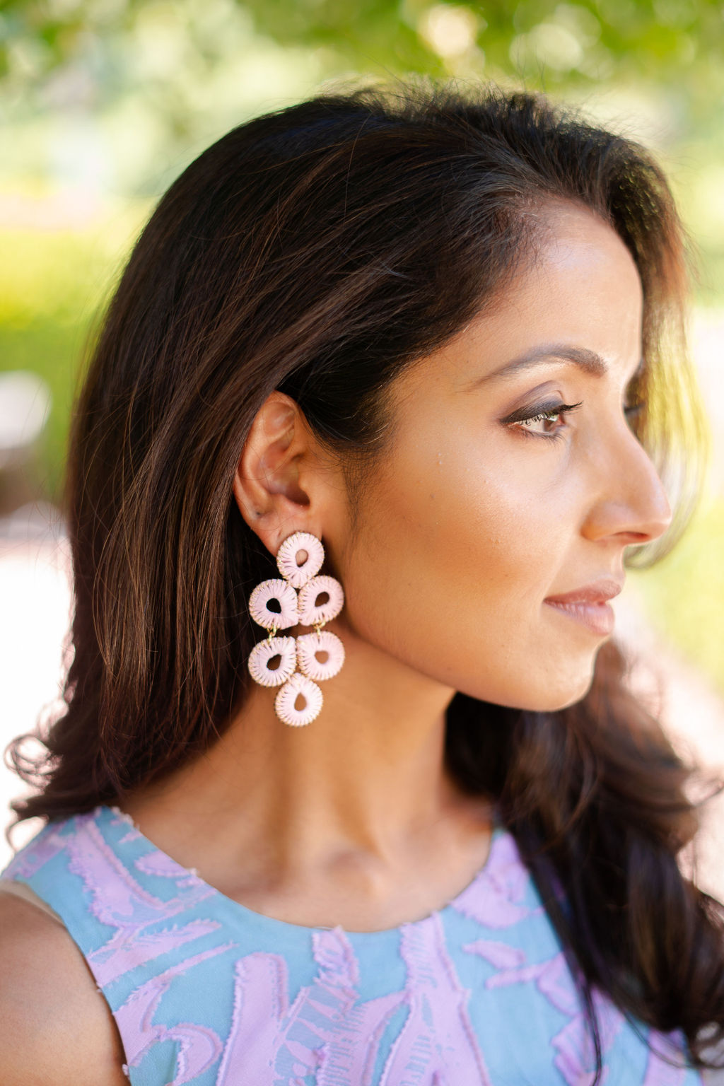 model wearing lisi lerch ginger pink raffia earrings